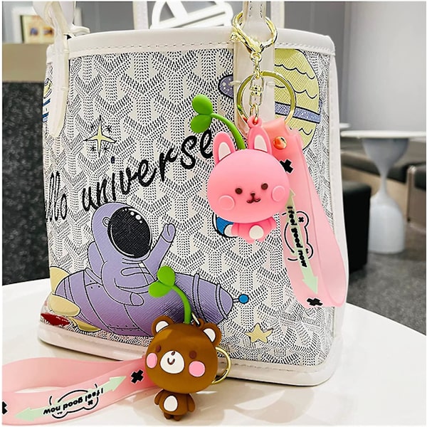 Söpö poika tyttö eläin avaimenperät itävät päässä sarjakuvaeläin laukku riipus auton avaimen riipus Kawaii reppu charmit sarjakuva