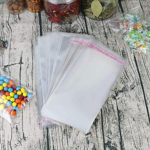 200-pack transparenta cellofanpåsar i plast med självhäftande förslutning 12 x 18 cm