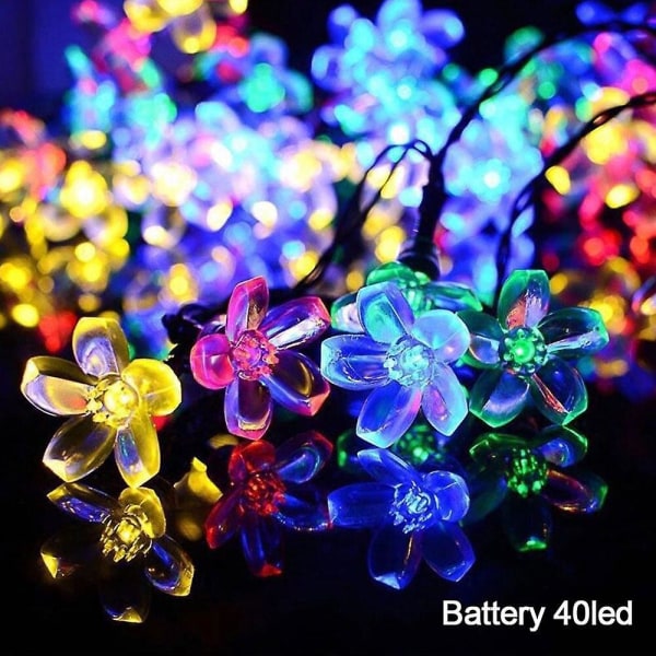 Solar Garden String Light Batteridrevet juleeventyrlys, vanntett blomsterkrans for gateplen uteplass（D，Hvit）