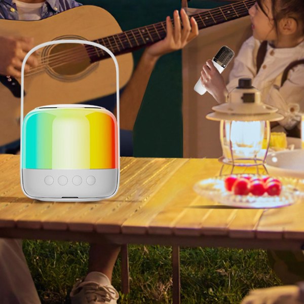 Bluetooth-högtalare utrustad med en mikrofon trådlös sång stor kapacitet lång batteritid bekväm för utomhusbärning (vit)