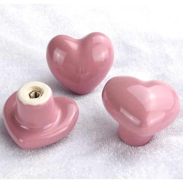 Set med 8 rosa hjärtformade knoppar i keramik till köksskåp för barnrum