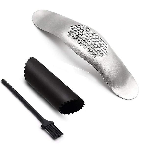 Hvidløgspresser Rocker med silikone skræller og rengøringsbørste rustfrit stål hvidløg chopper mincer presse.