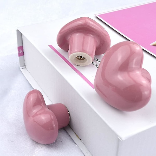 Set med 8 rosa hjärtformade knoppar i keramik till köksskåp för barnrum