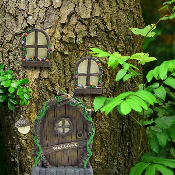 Älvdörrkit trädgårdsälvor och dekorationer i miniatyrträd