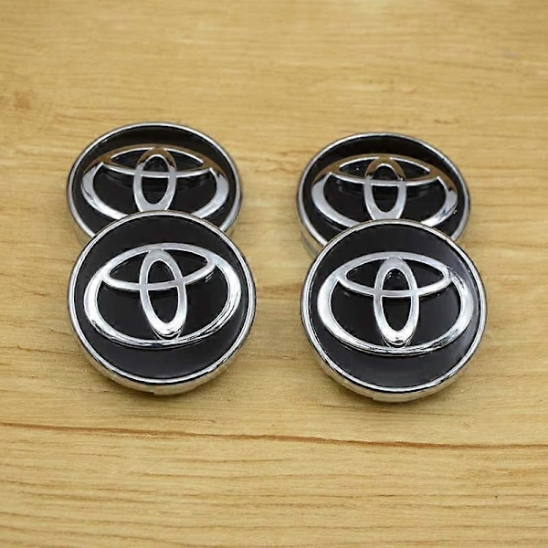 Toyota 4 kpl 62mm pyörän keskiön napakapseli logomerkille, musta
