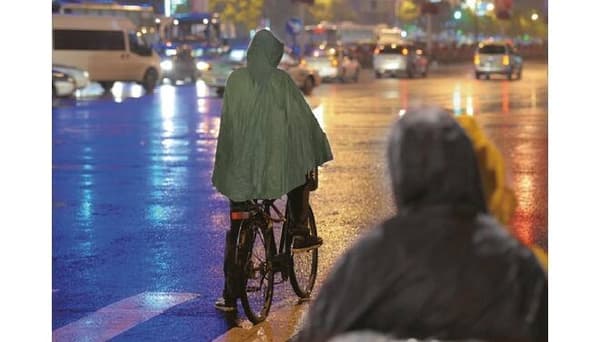 Genanvendelig regnponcho grøn
