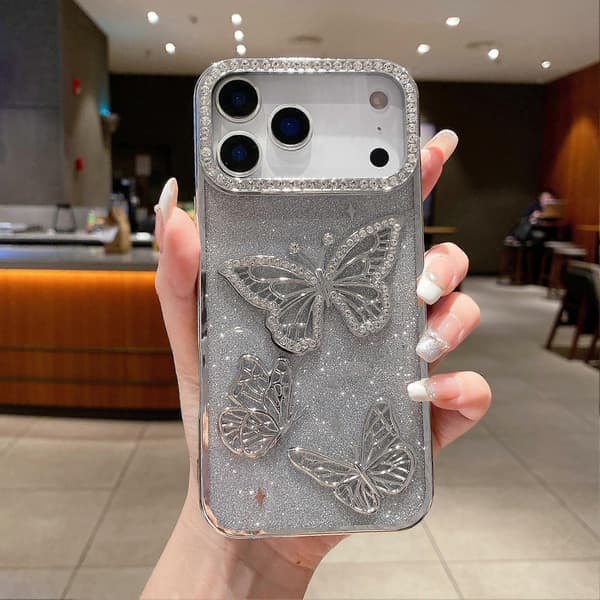 Etui til iPhone 17 Pro Max med rhinestone sommerfugldekor, TPU-bakside, sølv