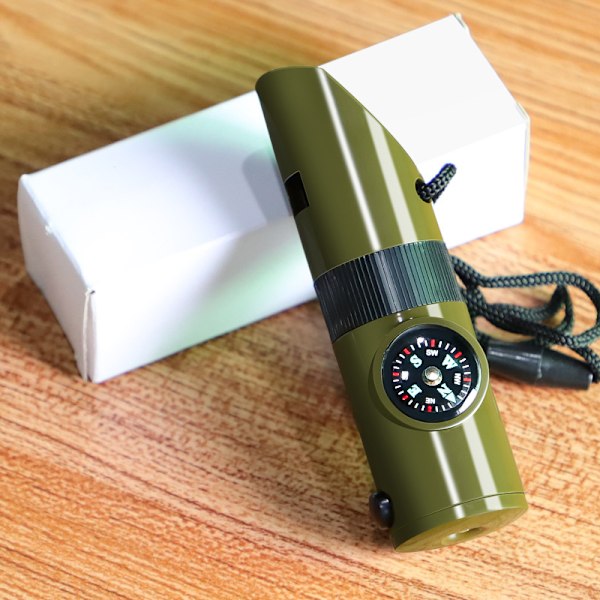 Selviytymisvarusteet ulkokäyttöön seitsemän-yhdessä pilli monitoiminen kannettava hätäkompassi suurennuslasi taskulamppu lämpömittari Multifunctional [7 in 1] whistle