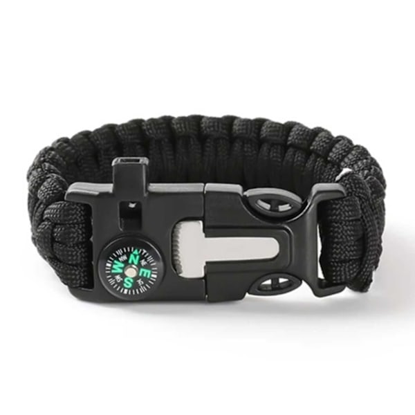 Paracord-rannekoru, jossa sytytystulppa, kompassi ja pilli musta musta