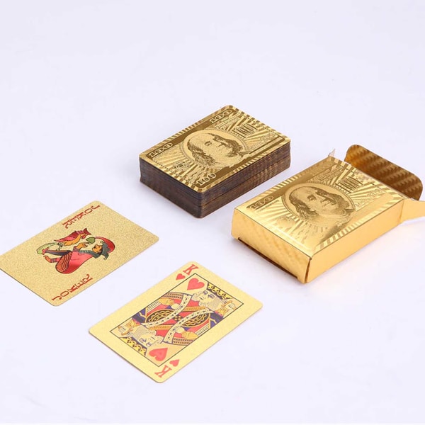 Forgyldte spillekort pokerkort i guld dollars guld