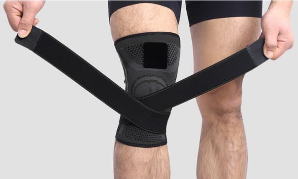 Knæstøtte med kompression og stropper – elastisk sportsknæbeskytter i størrelse L