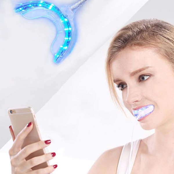 Hampaiden valkaisu kylmä LED -valo valkoisemmille hampaille valkoinen
