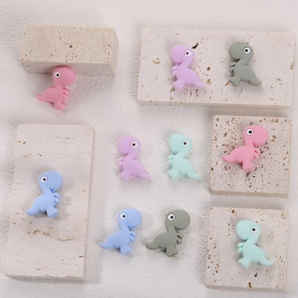 10 stycken söta dinosaurie silikonpärlor Mini djurdistans