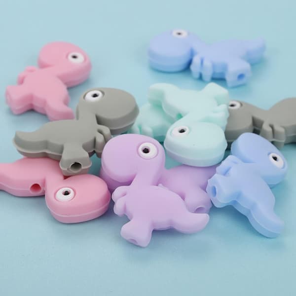 10 stycken söta dinosaurie silikonpärlor Mini djurdistans