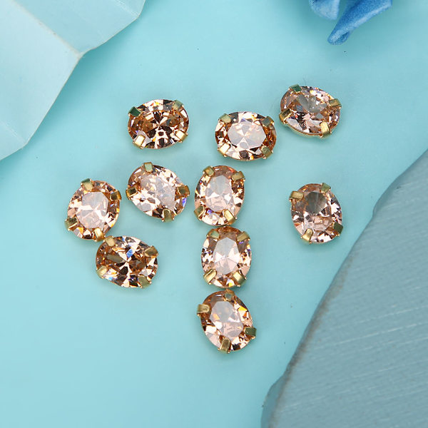 10 st Sömnad Zirkon Rhinestones Ellipsformad DIY Skor Kläder Tillbehör 8x10mm Champagne