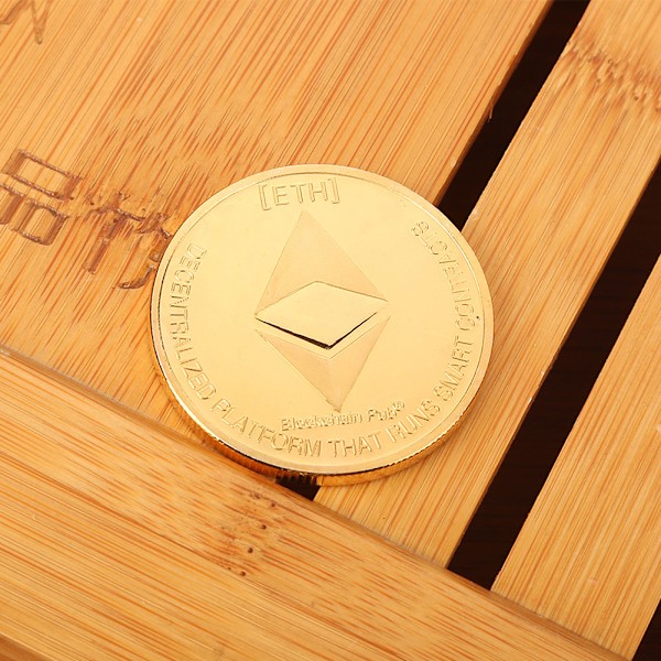 Samlarobjekt i metall, minnesmärke, souvenir, konstverk (guld)