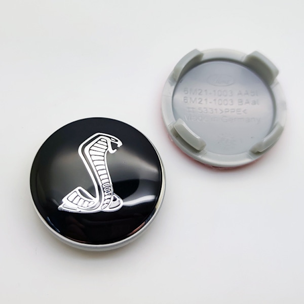 Navkapsel för karnevalshjul, 54 mm, svart orm (fyrpack)