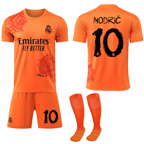 2024 Real Madrid Y3 Co-Branded Special Edition Rose Pattern Fodboldtrøje Orange Børns fodboldsæt No.10 Modric 28