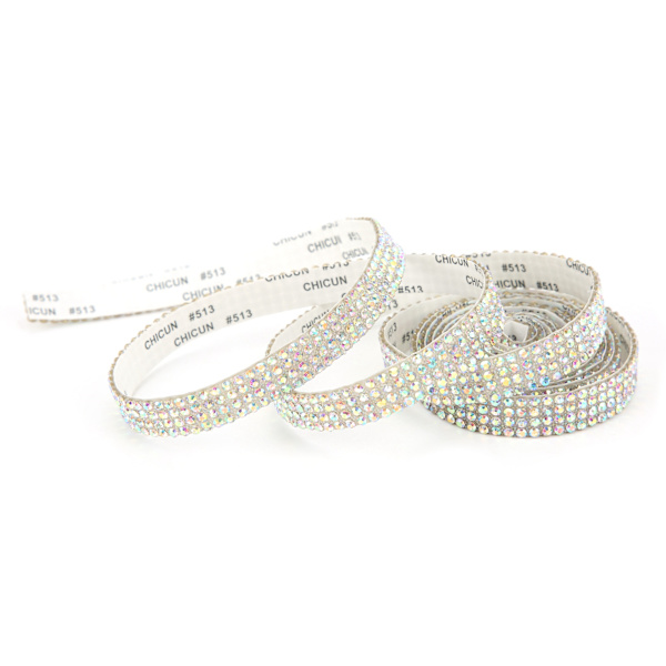 Rhinestone-nauha 4 riviä itseliimautuvia riisinauhoja, kimaltelevia bling-hartsiliuskoja kodin koristeluun, AB-väri