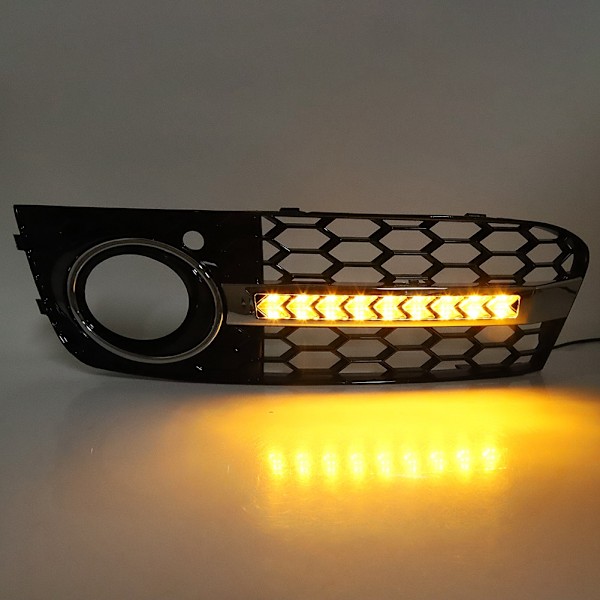 Auton etusäleikkö LED-vilkkuvaloilla ja päiväajovaloilla Audi A4 B8:lle (2009-2011)