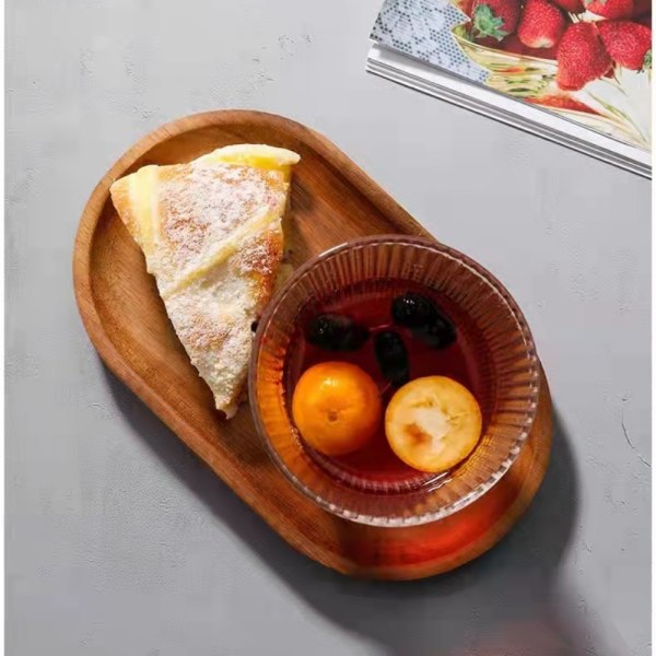 Set med 2 ovala serveringsbrickor i trä