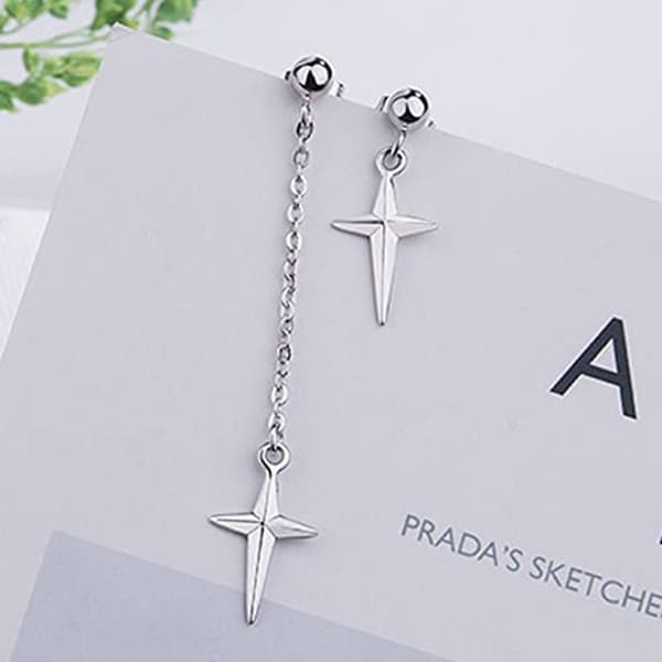 Asymmetrisk langleddet korsvedhæng ørelinje piercing