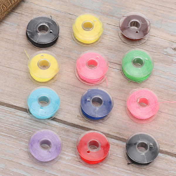 12 st symaskinstillbehör Spolar med tråd Bobbin Shuttle Core Hantverk Transparent