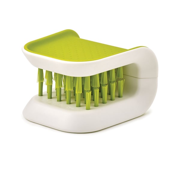 Grøn dobbeltsidet børsteskrubber til køkkenpinde, gafler, skeer og knive
