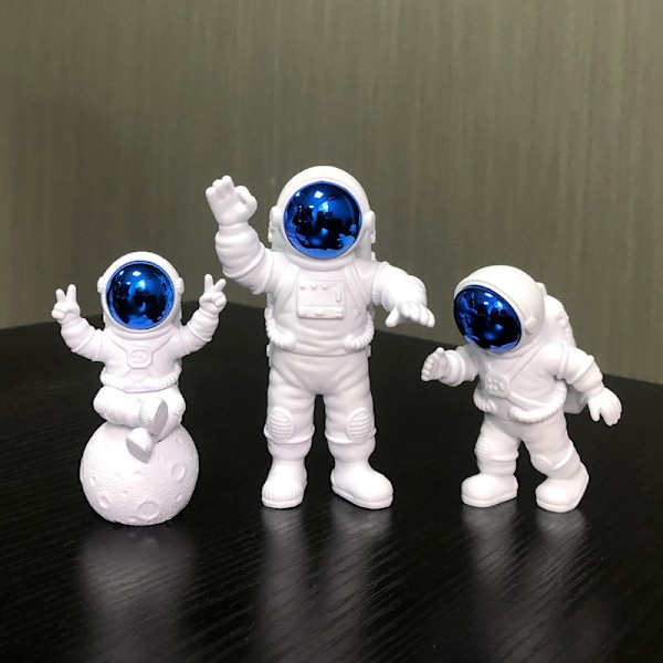 Blåvita astronautstatyer set om 3, rymdskulpturfigurer