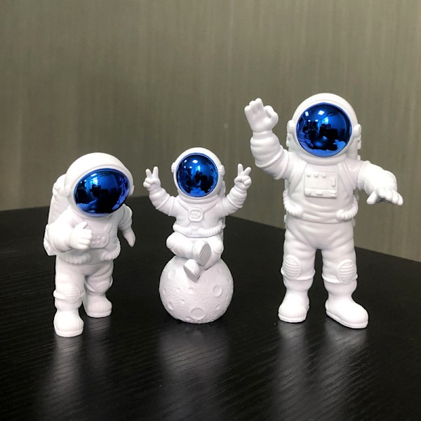 Blåvita astronautstatyer set om 3, rymdskulpturfigurer