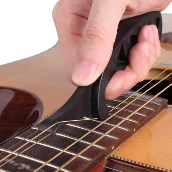 1 gitarrsträngssträckare för att omedelbart hålla nya strängar stämda