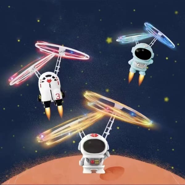Induktionsdriven Astronautflygplan med roterande glödande leksak för barn