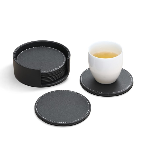 Set med konstläderunderlägg (6 underlägg + 1 hållare), svart, runda