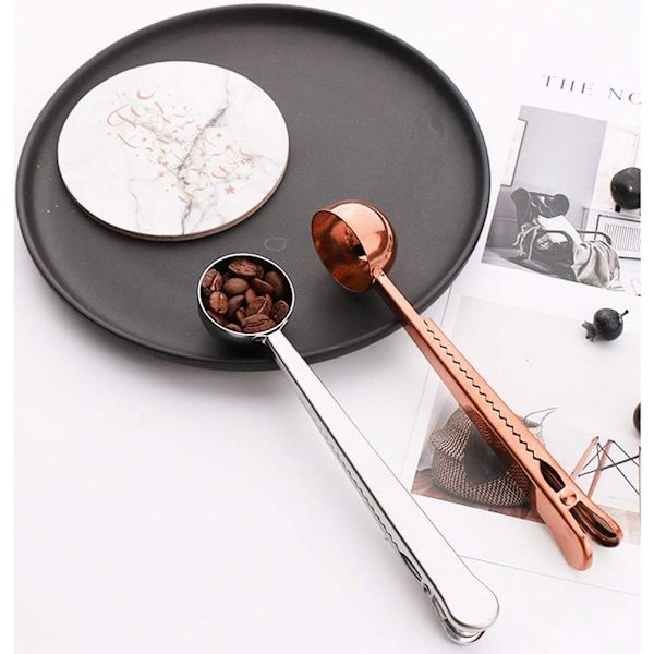 2 stk. sølv + rosenguld kaffeskeer med poseclips