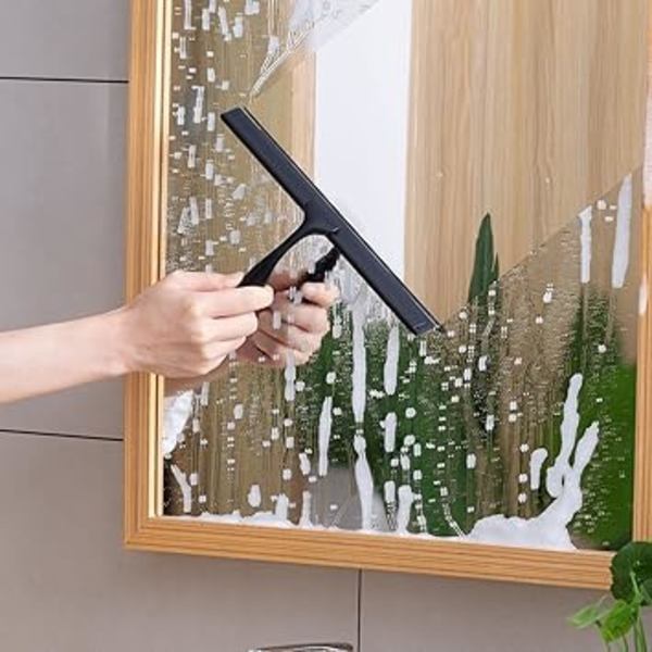 Svart. Duschsqueegee i rostfritt stål med stark sugkopp