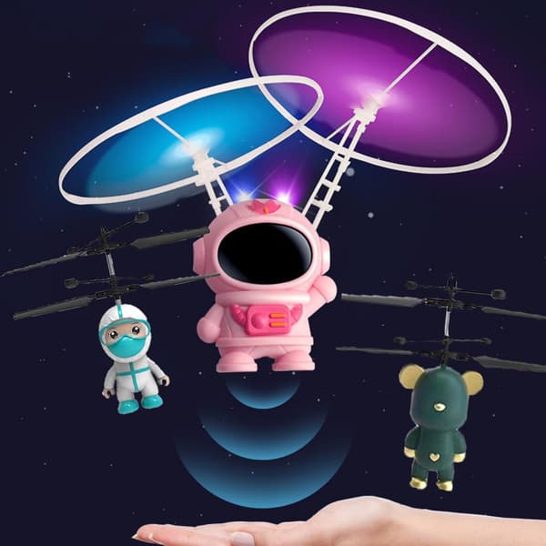 Induktionsdriven Astronautflygplan med roterande glödande leksak för barn