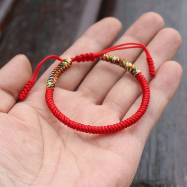 En lycklig röd buddhistisk lycka armband män kvinnor handvävda