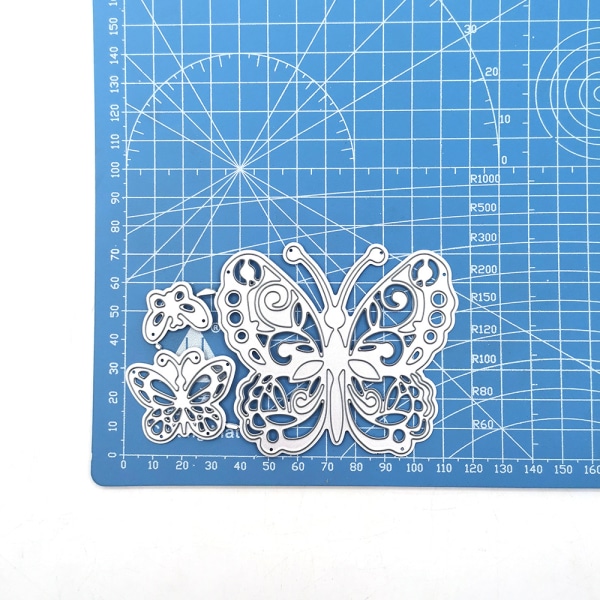 Perhonen muotoinen leikkuri scrapbooking- ja embossing-albumille