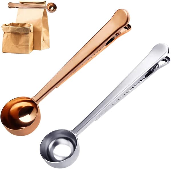 2 stycken silver + roséguld kaffeskedar med påsklämmor,