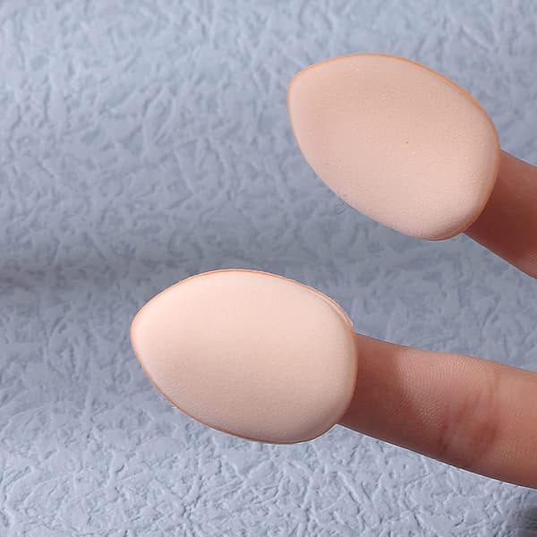 Tummeluftkudde puderpuff fingertopp finger mini concealer