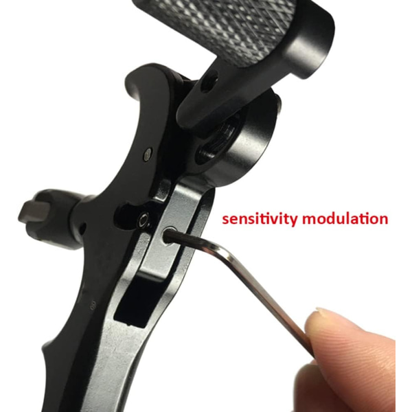 En röd spridare med 360° rotation, tre fingrar grepptrigger