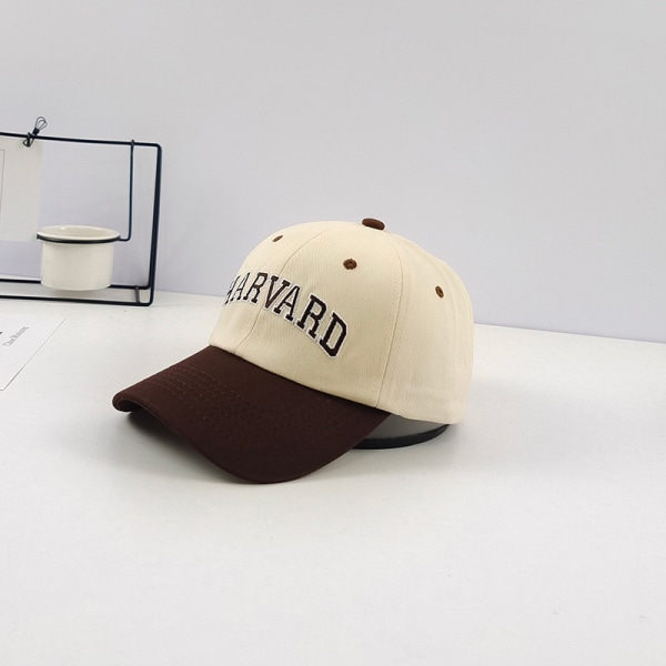 En brun baseballkeps för kvinnor, storlek M (56-58 cm), lämplig för