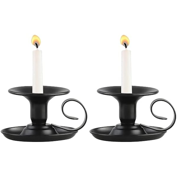 2 stycken smidesjärnsljusstakar i svart med handtag