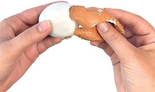 Keitettyjen munien kuorintaväline, musta