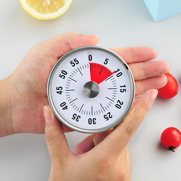 1 hvit visuell timer. Kan settes opp til 60 minutter, rustfritt