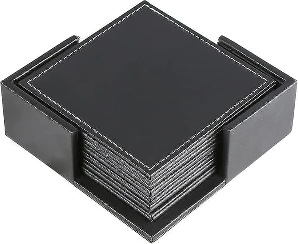 Set med 6 svarte skinnunderlag