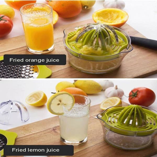 Manuell citruspress (citron/apelsin) med mätglas och integrerad rivjärn, grön