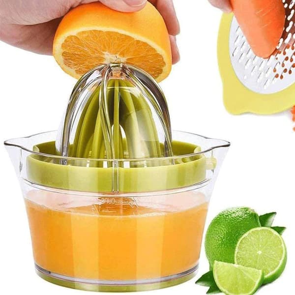 Manuell citruspress (citron/apelsin) med mätglas och integrerad rivjärn, grön