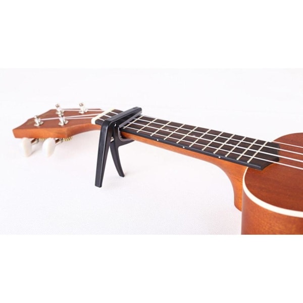 Gitarr Clamp Guitar Jaw Capo Clamp för Ukulele Guitar, 1st