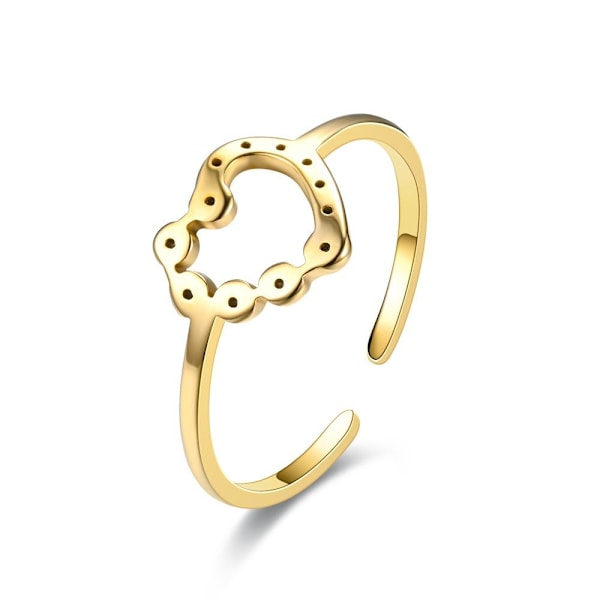 Lägg till en touch av Whimsy: Cut-Out Clover Arrow Ring - Unik, gyllene horoskop